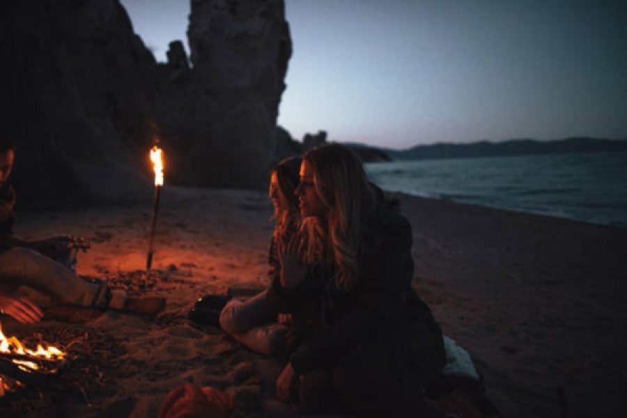 Live music by the fire on the beach